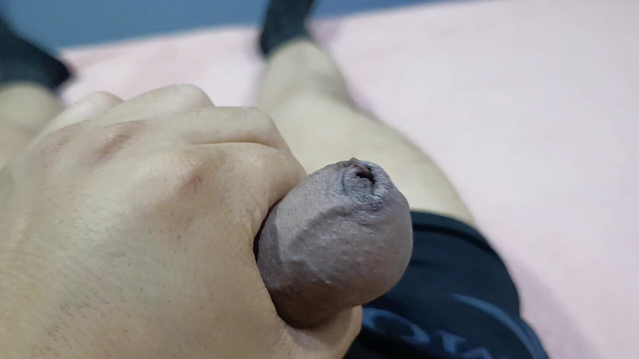 I massage my big cock on the hotel bed at night to really relax.