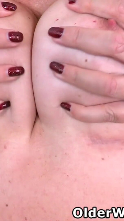 Blonde gilf Cassandra from the UK spoils you with her nylon clad cunny before she starts fingering herself | Clip 1
