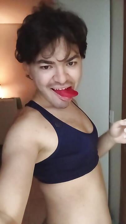 gay femboy sexy skirt lingerie and licking lollipop