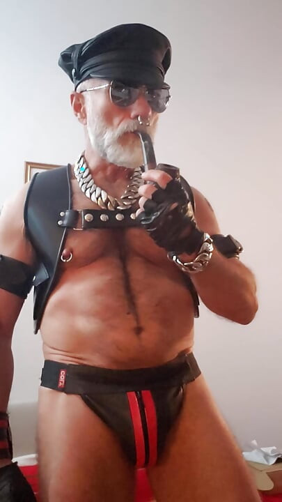 Cigar Stepdad Enjoyin Pipe with a New Pair of Nipple Clamps From Meo.de, Waiting for a Boy to Come and Play with Them