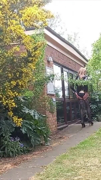 Emotional moment from "Crossdressing Gina Cumming in Panties Outdoors"