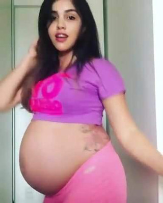 Sexy preggo latin with wide hips dancing sexy