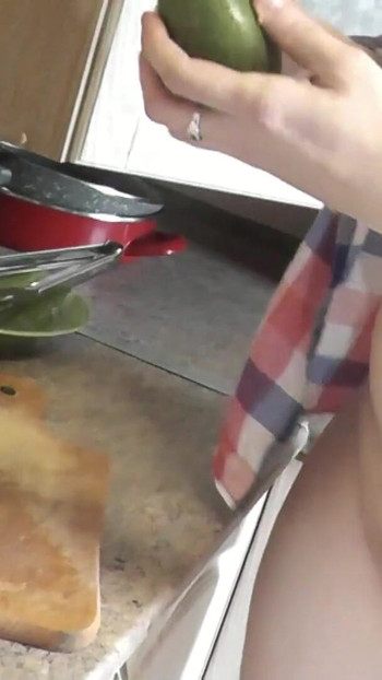 Thrilling moment from "Milf sexy Platinum continues naked cooking in kitchen preparing salad for Christmas without panties "