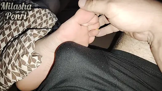 Stepsister's feet get a light massage while watching a movie