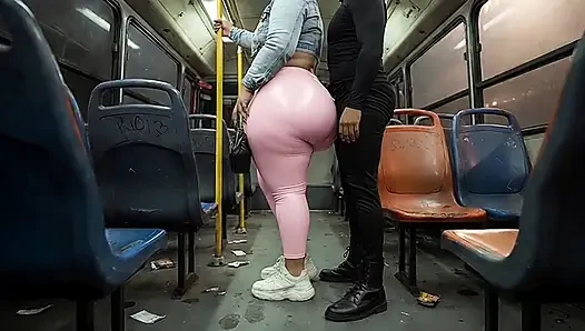 "Balaclava BBW Gets Ass  in Tight Shiny Pink Pants - Public Bus"