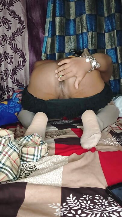 Crossdresser in white stockings