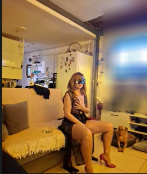 Masked Amuse Gueulle in a sheer dress teases with a dildo Part 1
