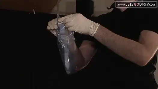 Milf moans as pussy is injected during catheter insertion