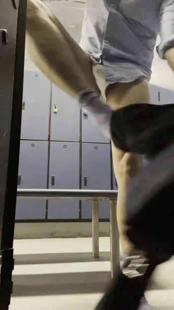 Changing in the locker room and showing my chastity cage.