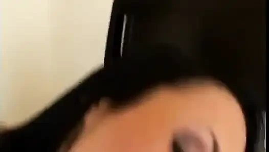 Slender brunette with a pierced tongue sucks the cameraman's cock