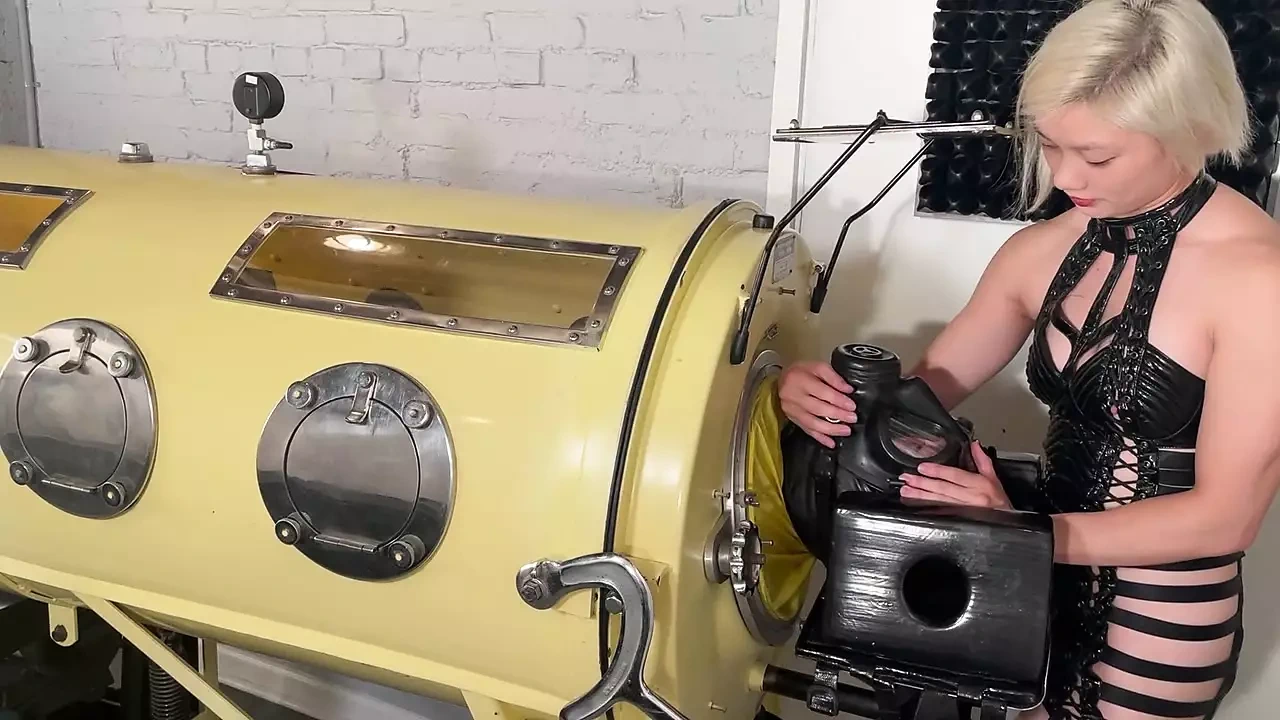 Latex gimp in the Iron Lung