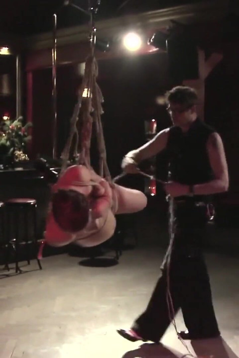 Hot girl gets hanged while in bondage next to the mirrors