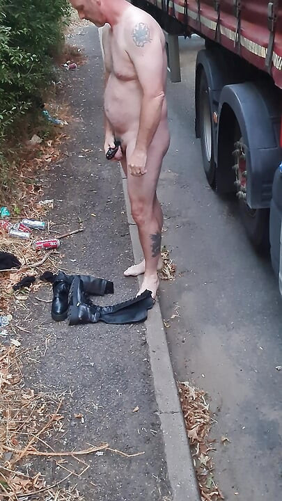 Cock locked sissy sucking dildo outdoors