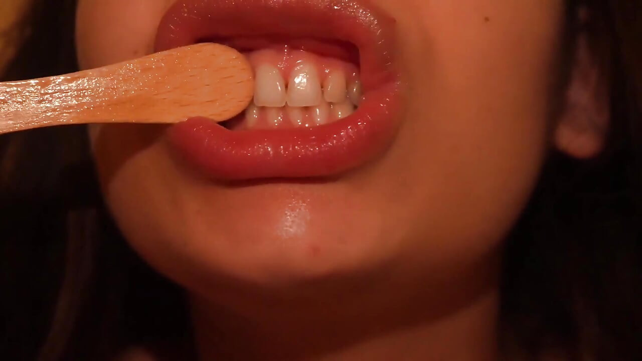 I Eat the Popsicle and Suck on It. After I Eat the Popsicle, I Examine My Mouth and Throat with the Popsicle Stick