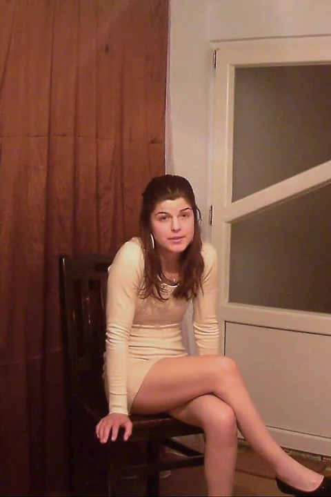 Girl eats desert and then pee in the cup