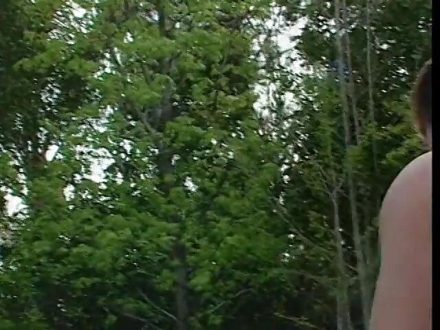 Two horny studs taking turns to fuck a busty blonde outdoors