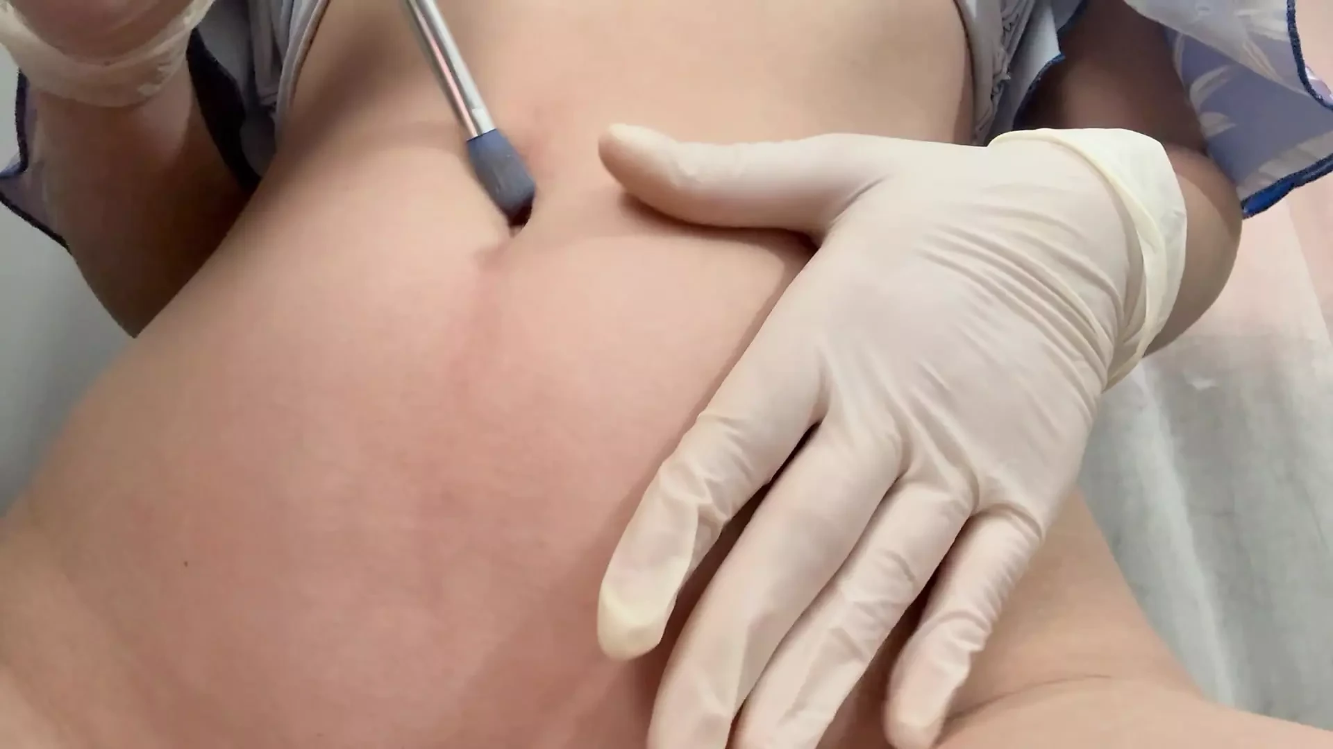 I play with medical gloves belly button