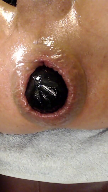 Captivating moment from "extreme insertion with selfmade 4.5 inch buttplug"