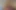 Sarı saçlı, file naylon giymiş devasa dildo biniyor
