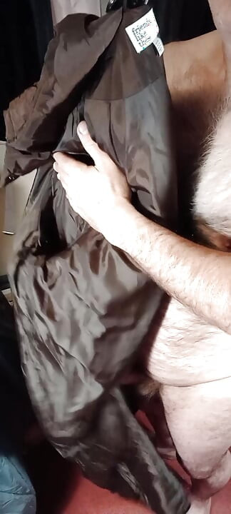 Fucking the shiny lining of a long brown lady wintercoat
