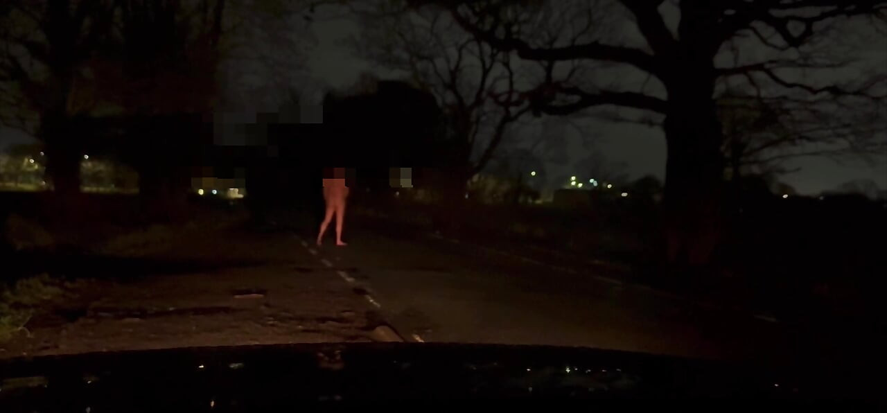 Patiently waiting naked outside for cars to hide from
