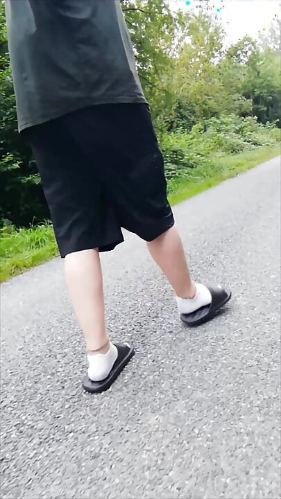 In Slippers and White Socks in Nature
