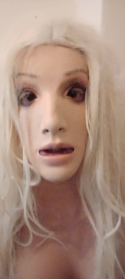 Silicone doll playing with pussy