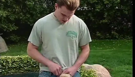 Two horny studs taking turns to fuck a busty blonde outdoors