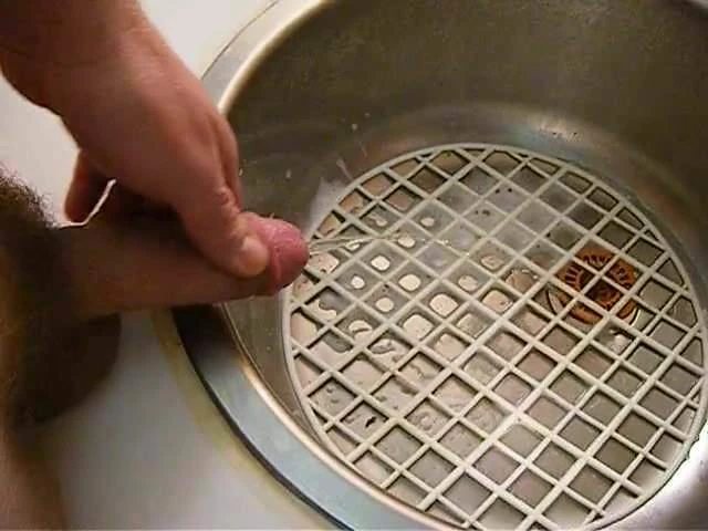 Piss and cum in the kitchen.AVI