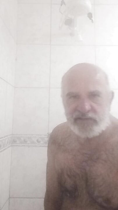 HAIRY BRUTE TAKING A SHOWER