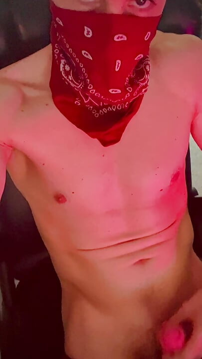 Athletic hunk in bandana cover jerking