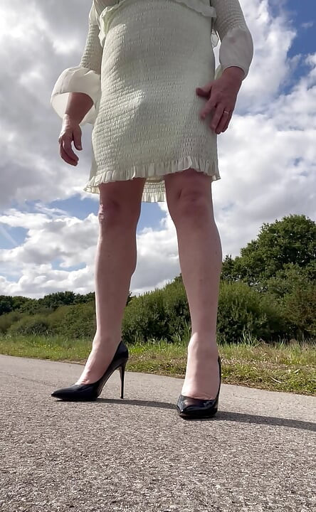 Crossdresser husband windy summers day wanking outdoor exhib in heels dress tits n ass.
