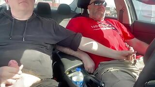 Stroking our Cocks In car in a parking lot