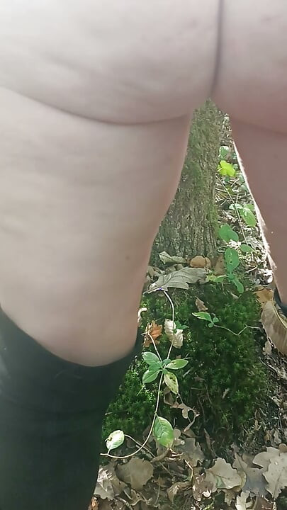 Slut Jade in the wood shows off in front of voyeur