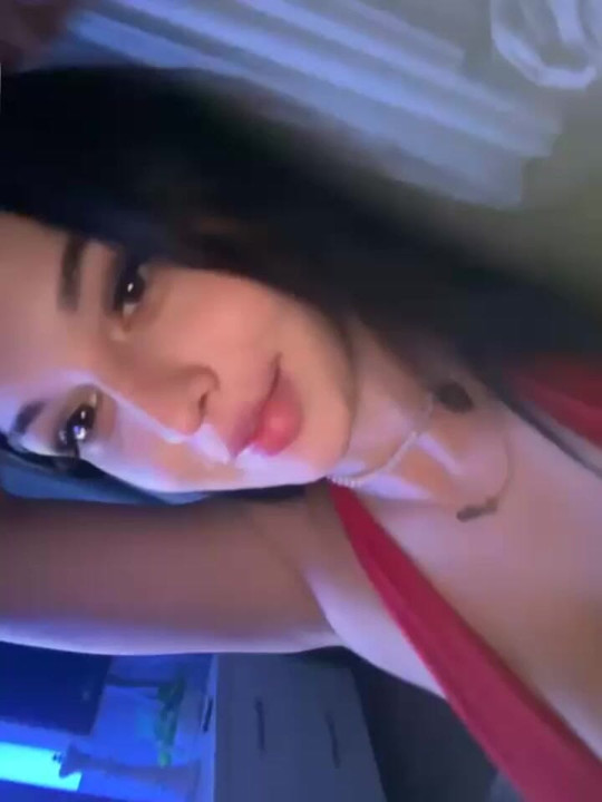 These tits are barely staying in this red top