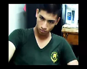 A cute Thai soldier shows his cock on cam.