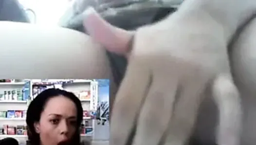 Lady at work fingers her pussy, shows tits while working