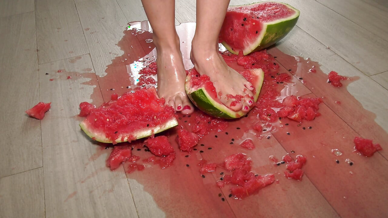 Busty MILF Presents Her Feet and Plays with a Watermelon