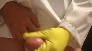 Rubber glove handjob and cum
