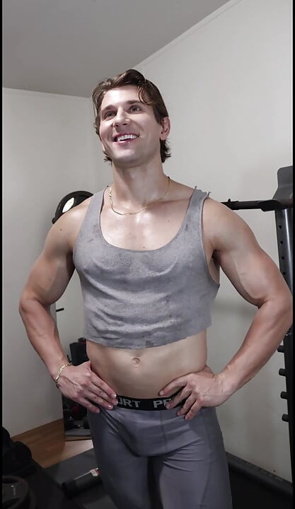 Adonis Beautiful Bodybuilder Boy Poses and Tries to Get You Workout
