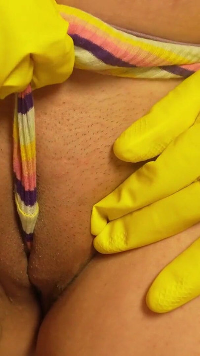 Pregnant Stepsister is in the bathroom wearing yellow dishwashing gloves and doing camel toe pussy then playing with | Clip 1