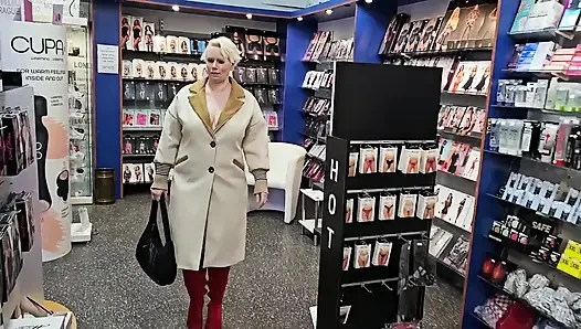 With Bare Tits in the Sex Shop