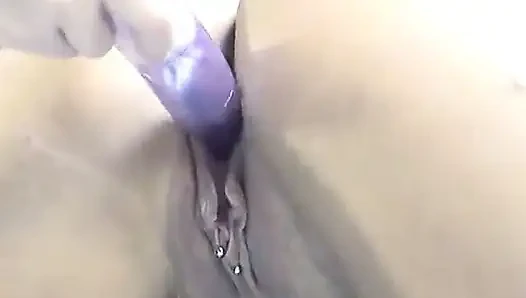 Horny lesbian brunette drills girlfriend's moist cunt with vibrators on sofabed