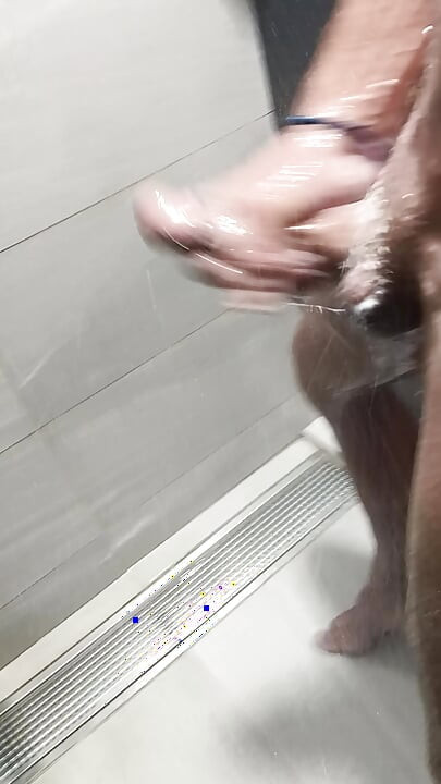 Handjob at work in the shower quickly