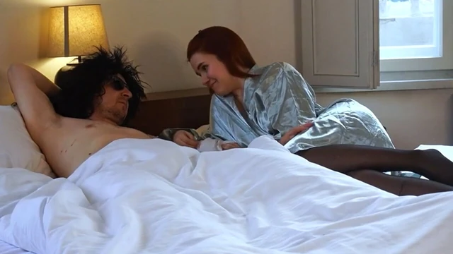 Redhead MILF and her husband in the bed where she gets angry at his small cock