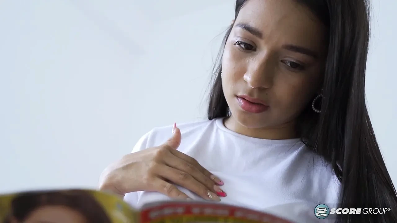 Emma Anturin is a skinny Colombian teen who reads a porno