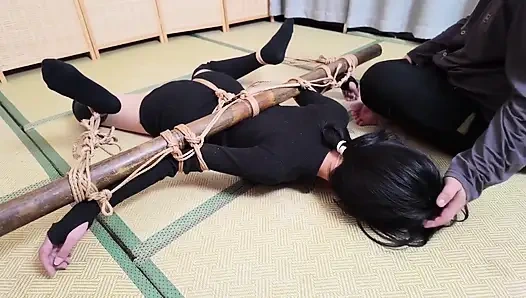 Xr40-a Girl in Black Stocking Is Tied to a Cross