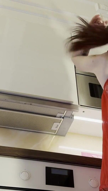 Must-see moment from "Hot sexy redhead college girl with her long legs and cotton panties in the kitchen gets bored and ignored"