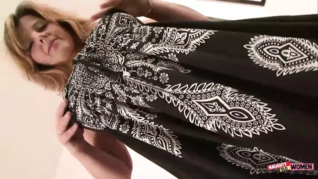 After dressing up provocatively the naughty blonde milf enjoys intense interracial sex with cum swallowing