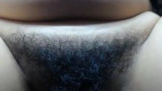 Mature mom shows her hairy cunt close-up